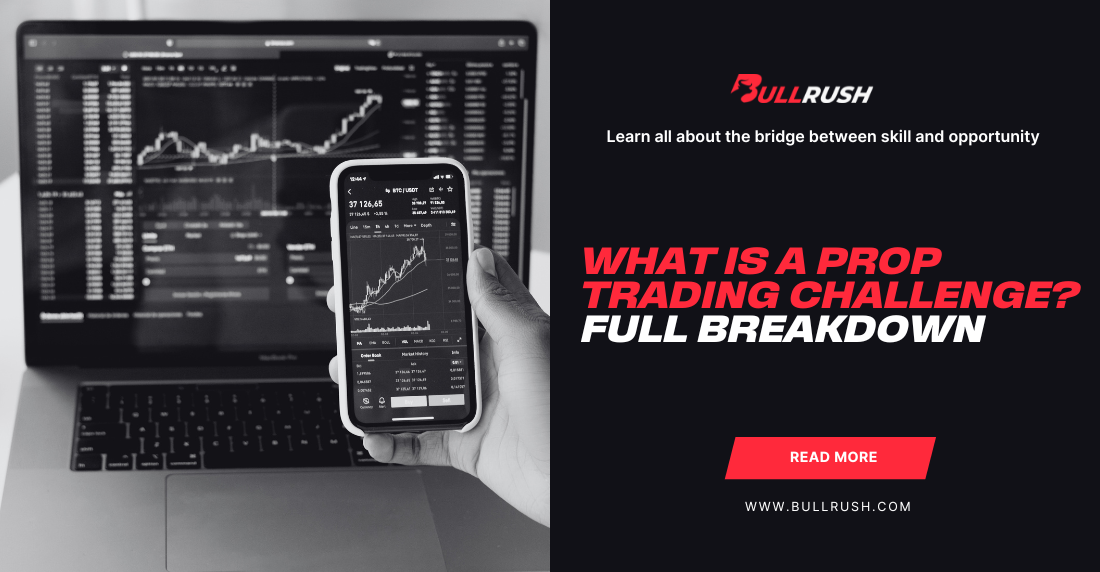 A hand holds a smartphone displaying stock market graphs, in front of a laptop with similar data. Text reads, "What is a Prop Trading Challenge? Full Breakdown." The tone is informative and professional.